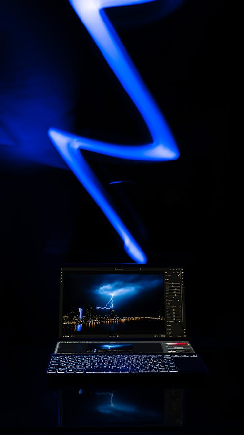 Foto profissional grátis de à noite, asus, computador portátil