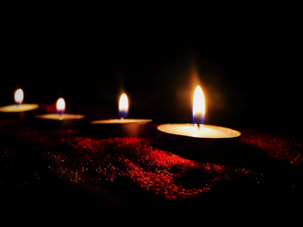 Four Lighted Candles