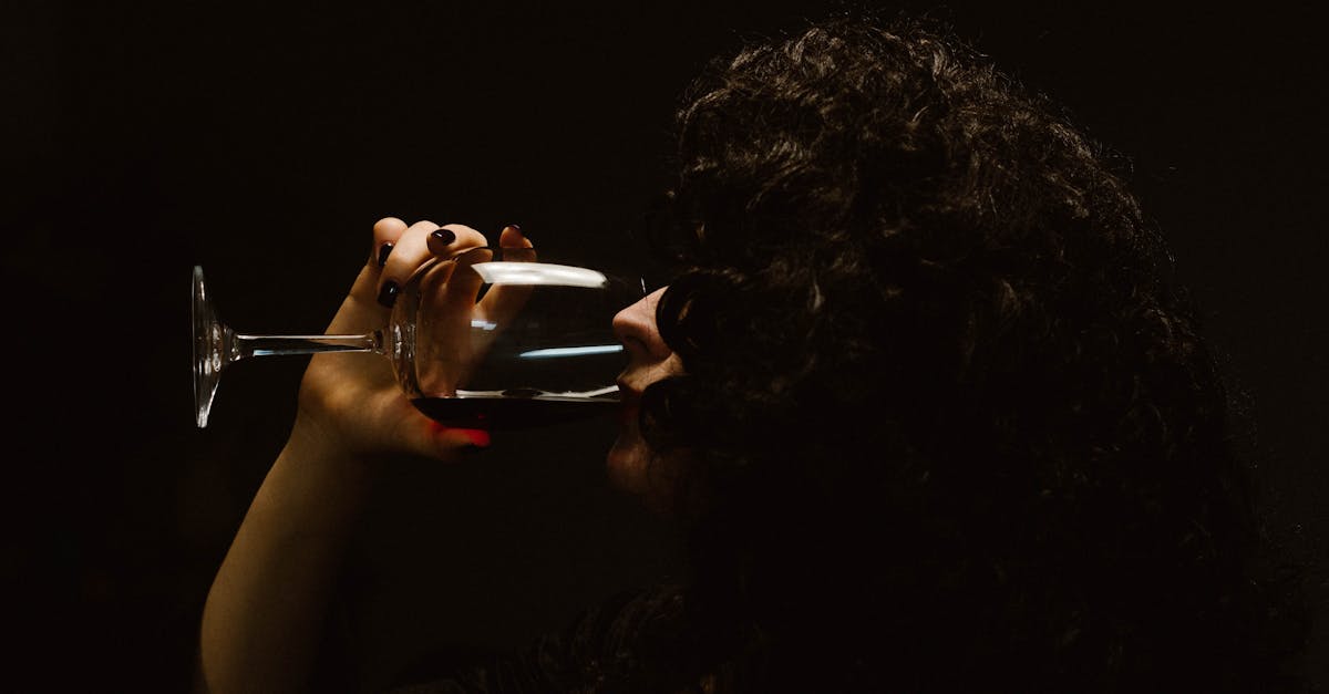 Person Drinking Wine From Glass
