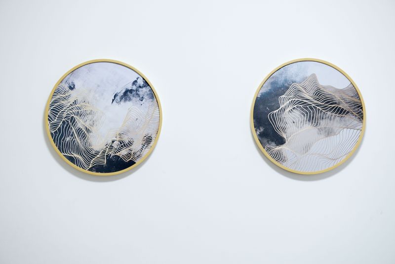 Gold Frame Mirror pieces on a wall