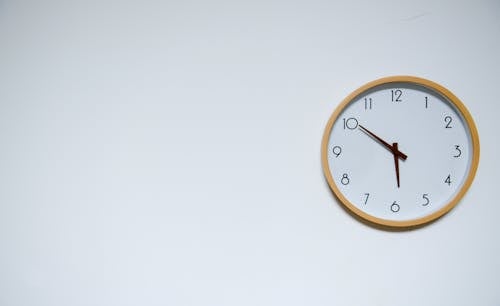 Free Wall Clock at 5:50 Stock Photo