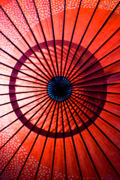 Traditional paper parasol in close detail, photo by Andrey Grushnikov on Pexels