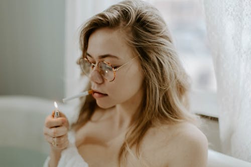 Woman Lighting Up a Cigarette