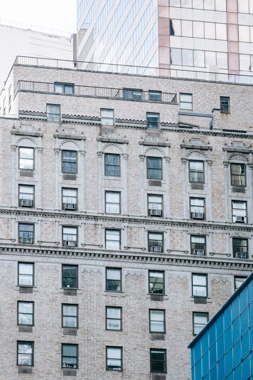 Facades of modern buildings on city street · Free Stock Photo