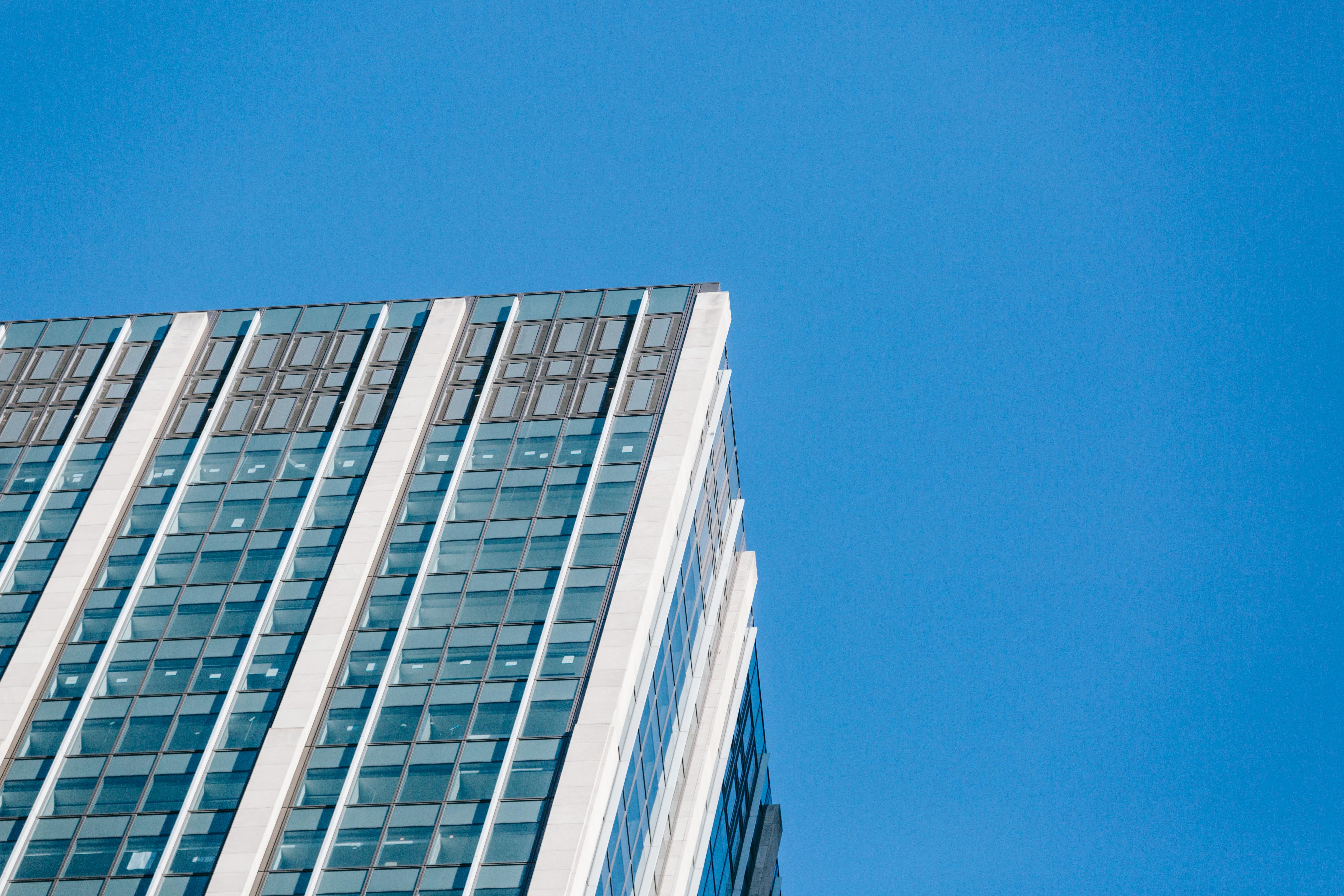 fragment of contemporary building against blue sky