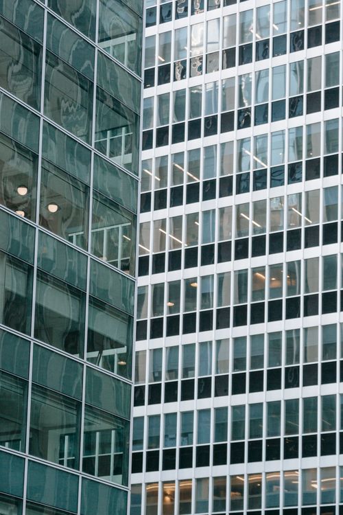 Free Full frame modern office skyscraper with glass walls in contemporary city downtown in daylight Stock Photo