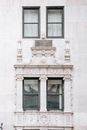 Old stone building exterior with decor in town