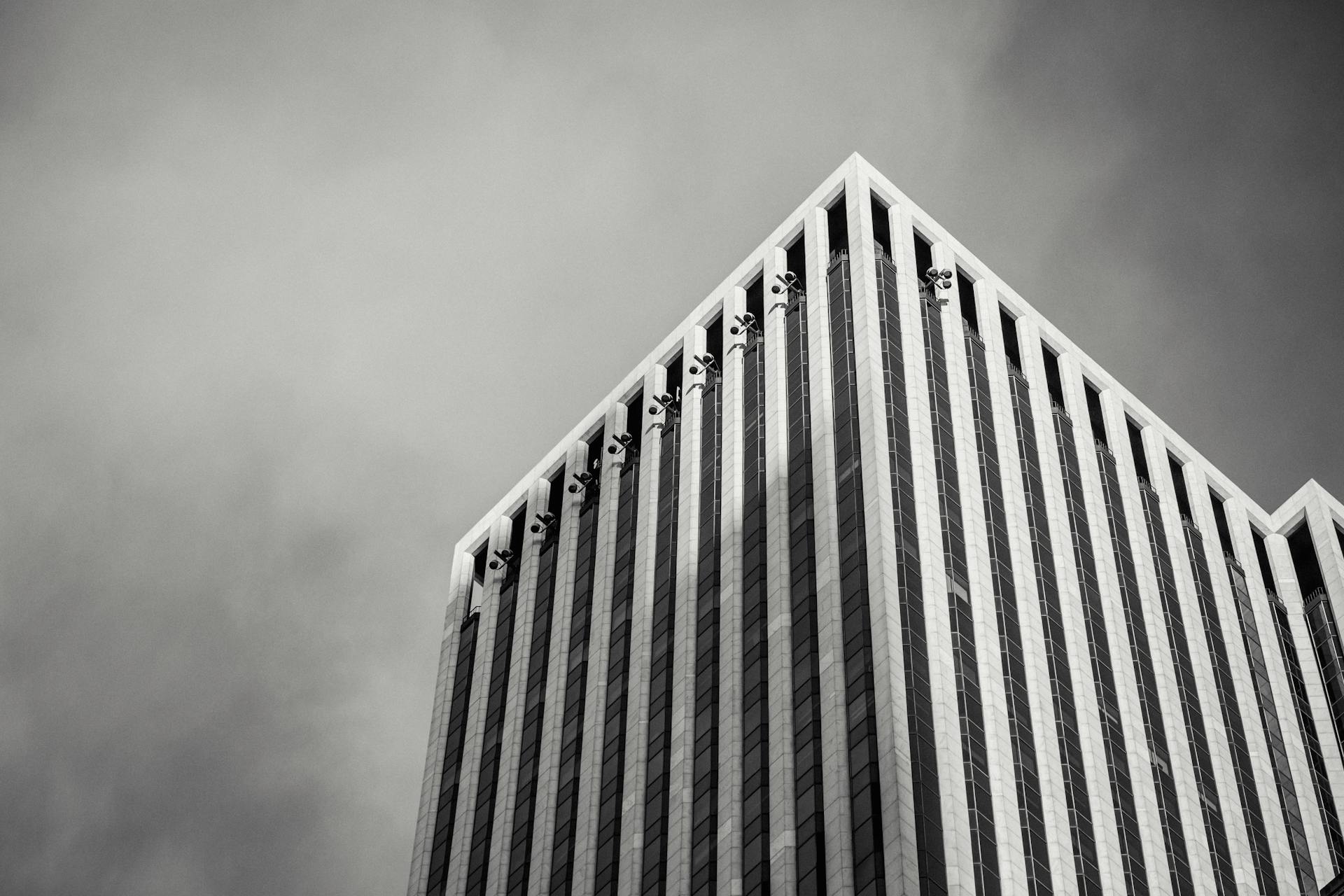 Corner of tall financial skyscraper in megalopolis