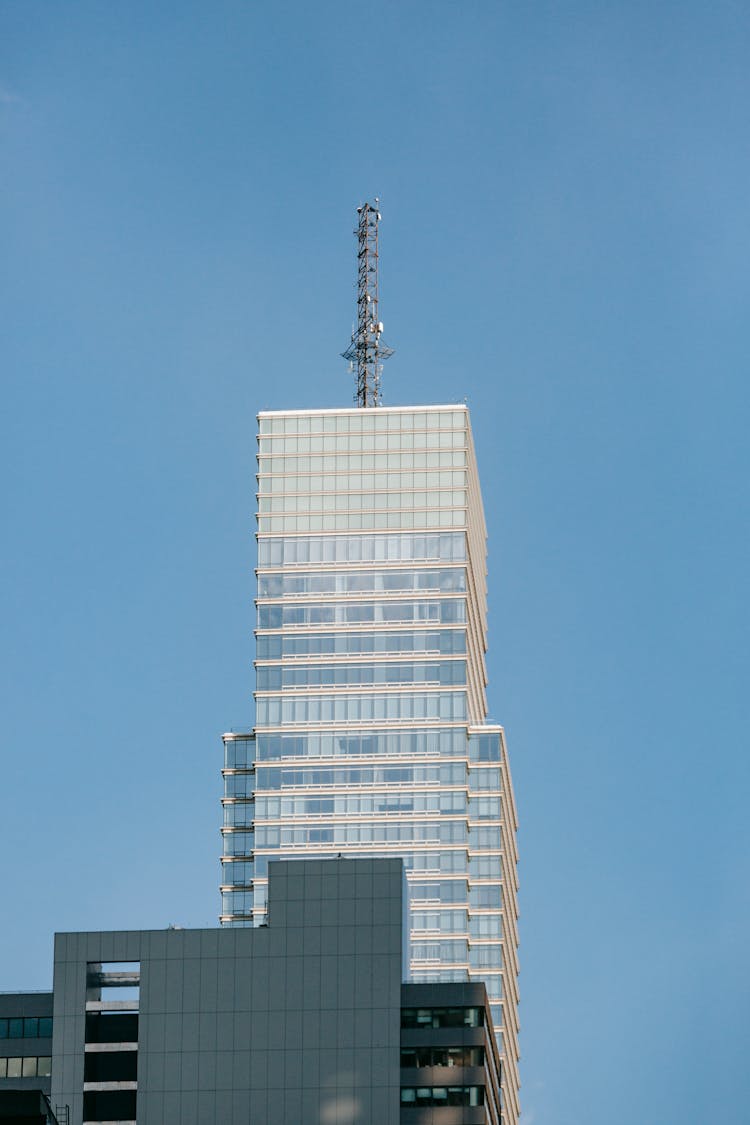 High Rise Building With Communication Tower On Top