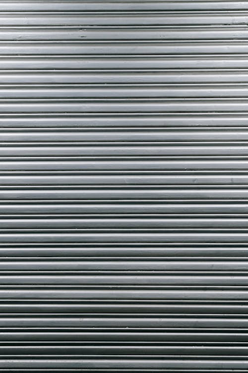 Free Textured smooth wall with metal profile Stock Photo