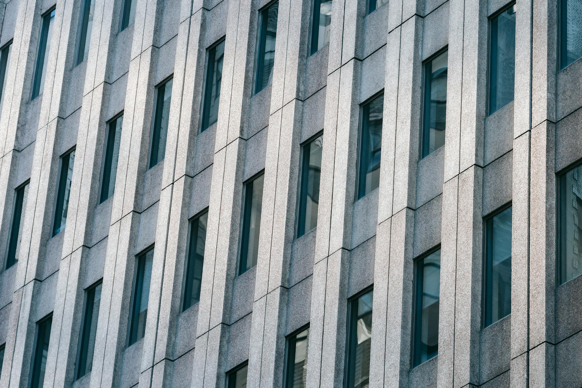 Facade of multistage building with geometric shapes