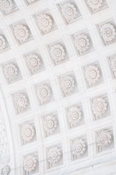 Detailed view of ornate ceiling carvings in Washington Square Arch, New York City. by Laura Tancredi