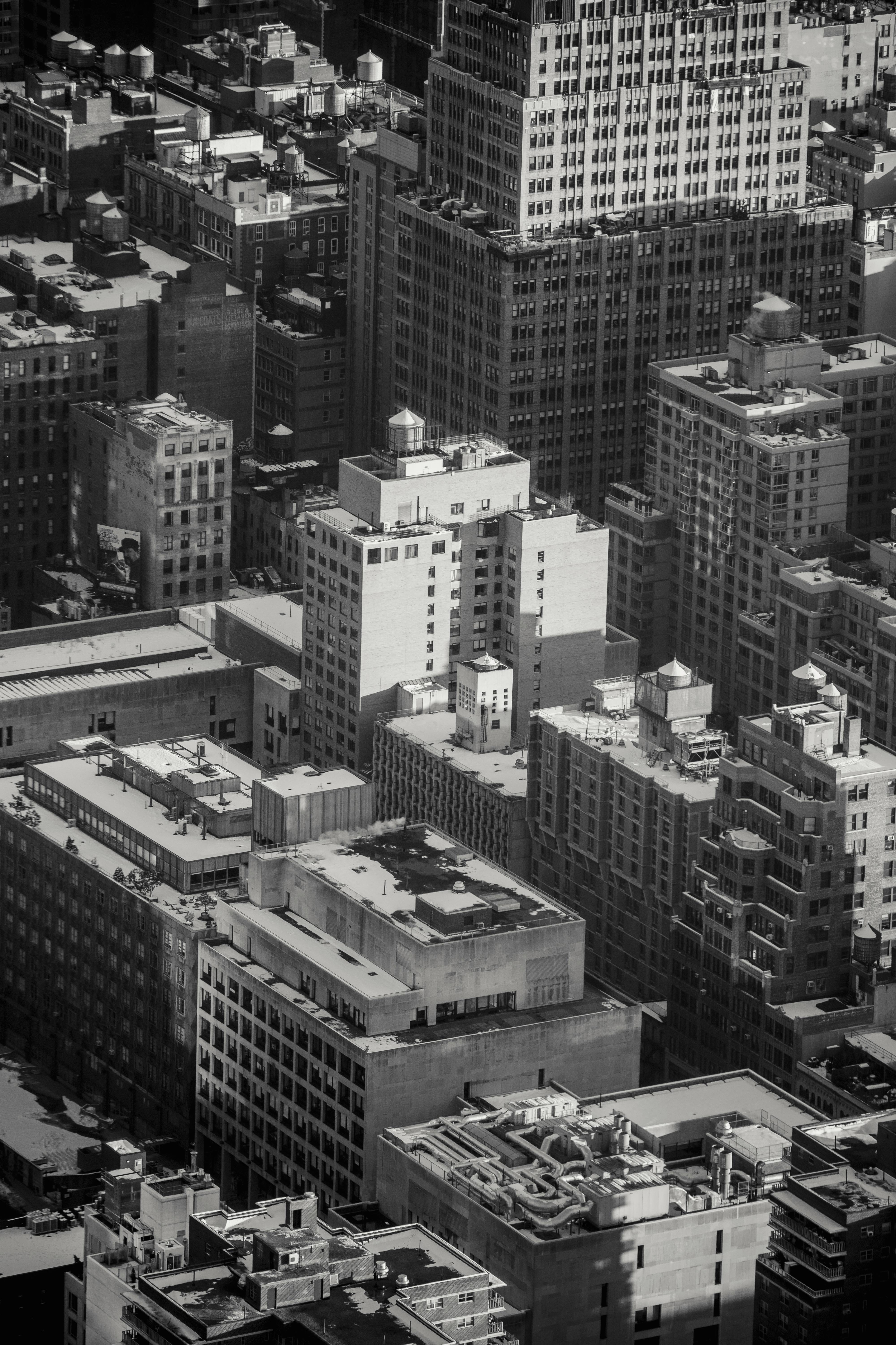 black and white cityscape with contemporary architecture on sunny day