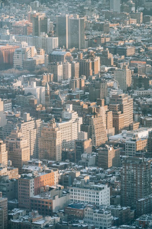 Drone view of multistory residential buildings located in living district of modern city