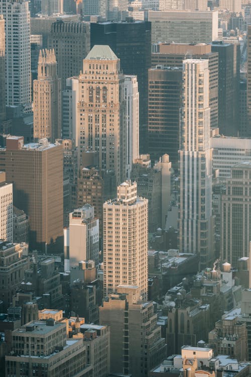 Free High business towers and residential buildings located on streets of modern district of New York Stock Photo
