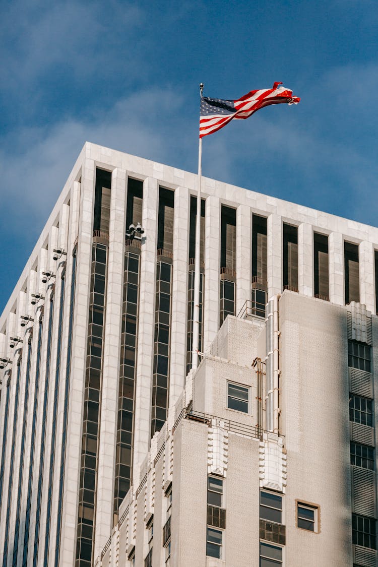 Facade Of Buildings With American Flag