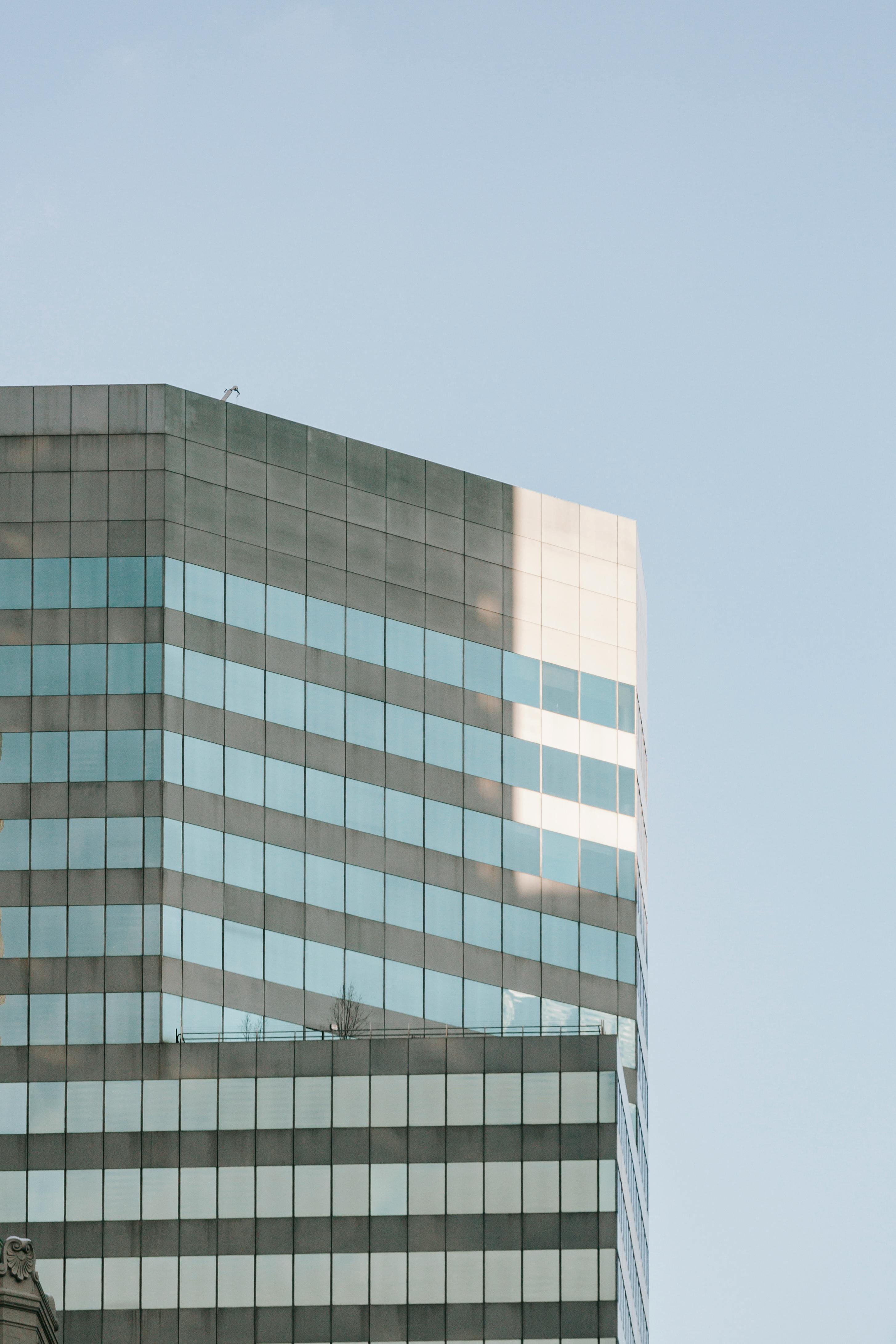 facade of building with windows under blue sky