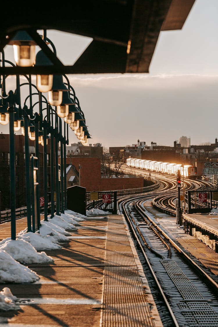 Train Riding On Railroad In Winter Day