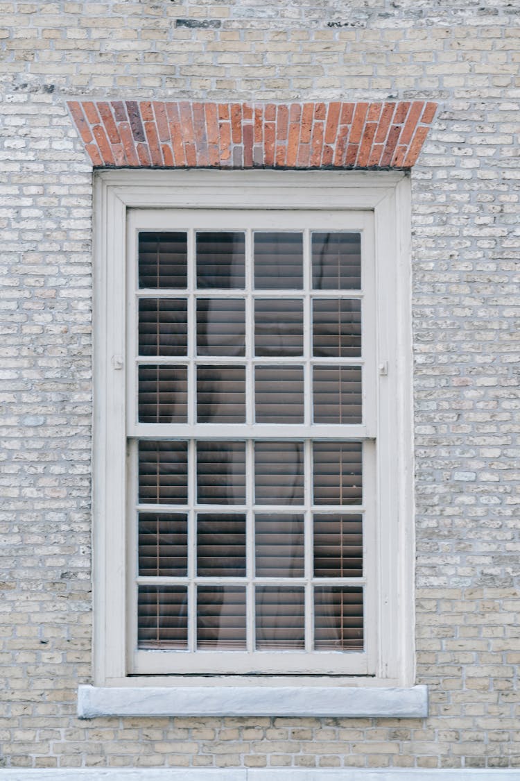 Window Of Old Brick Residential Building