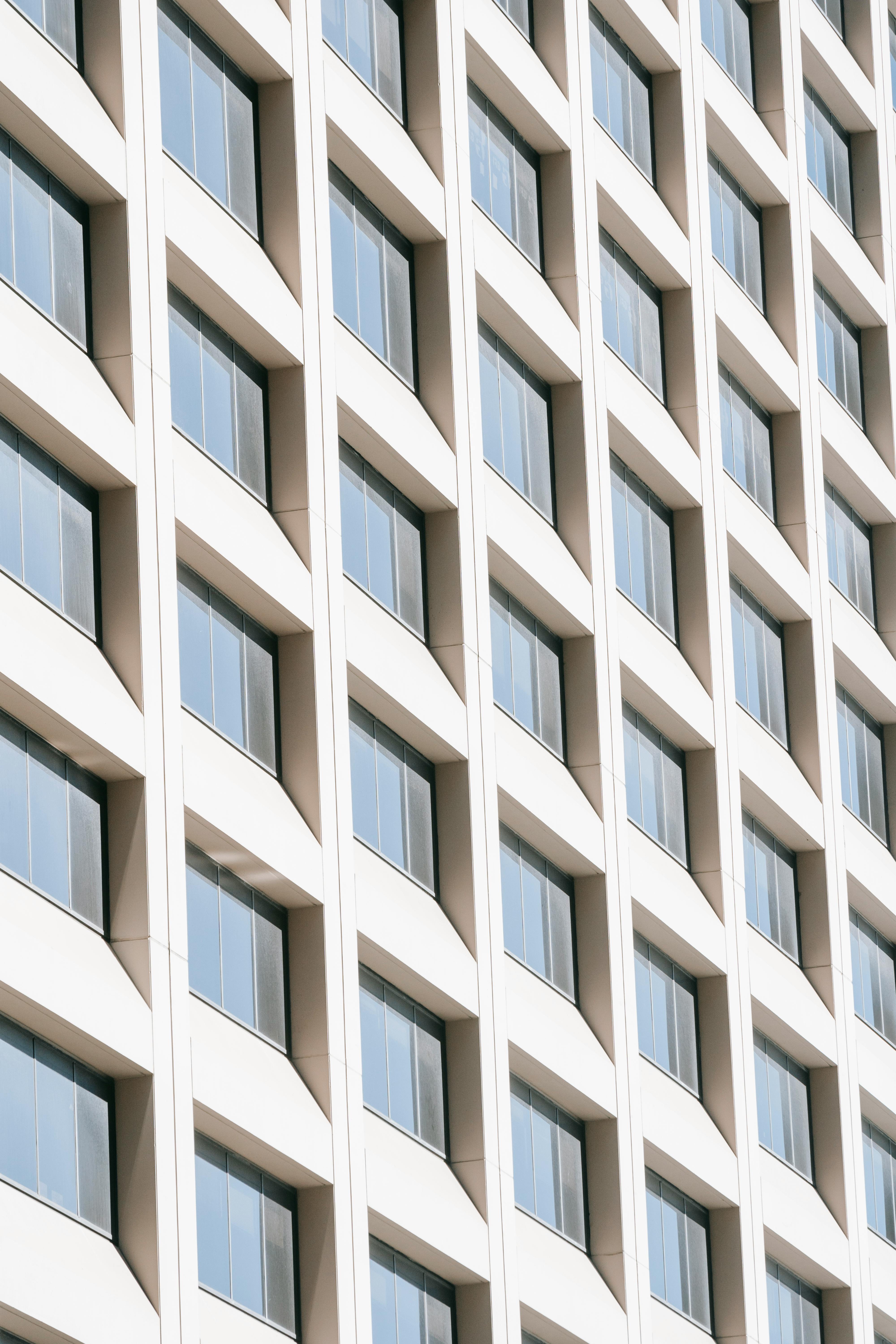 facade of modern geometric building with symmetric windows