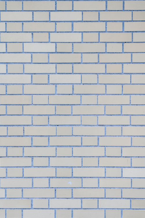 Free Textured full frame background of smooth stone wall with gray brick in rows Stock Photo