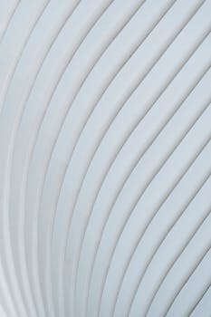 Minimalistic smooth white wavy wall with parallel lines for abstract geometric architectural background
