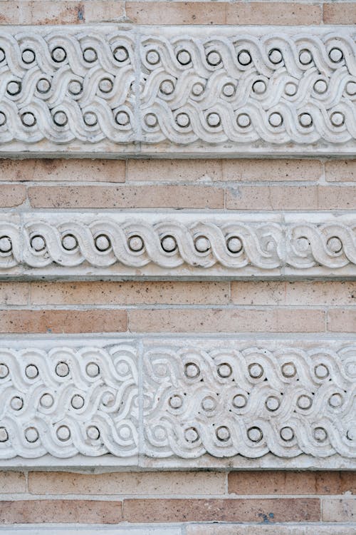 Ornamental relief of stone building with brick blocks