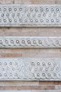 Ornamental relief of stone building with brick blocks
