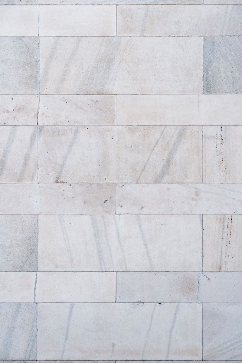 Close-up of grey marble tile texture on a wall