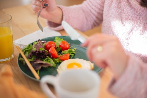 Free Egg and Vegetables on Green Ceramic Plate  Stock Photo