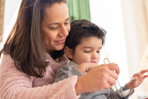 Free Mother Taking Care of Her Son Stock Photo