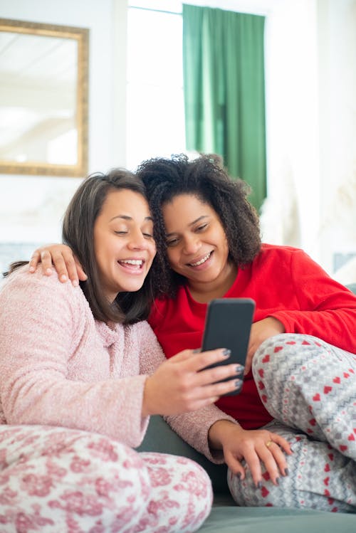 A Couple Taking a Photo Together while Smiling