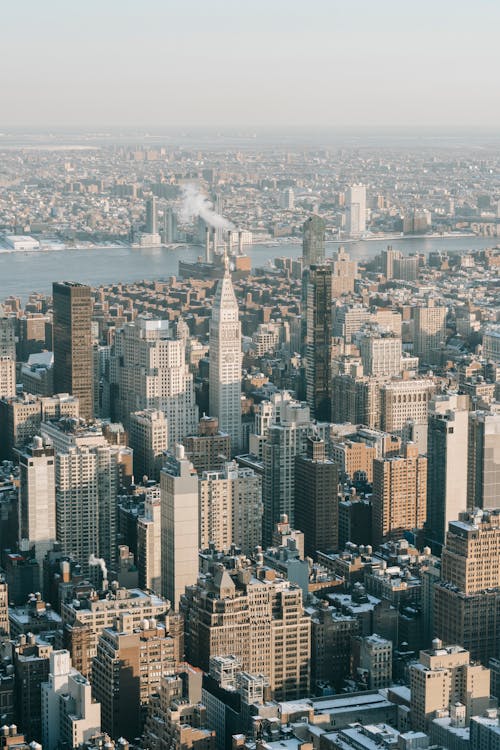 Free Contemporary megapolis with skyscrapers on shore of bay Stock Photo