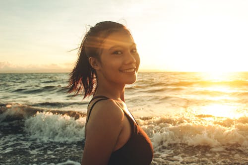 Close-up Photo of Smiling Young Woman 