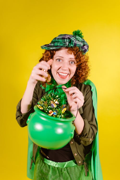 A Woman Holding a Pot of Gold