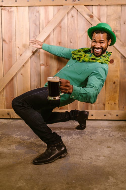 Free Goofy Man holding a Jug of Beer Stock Photo