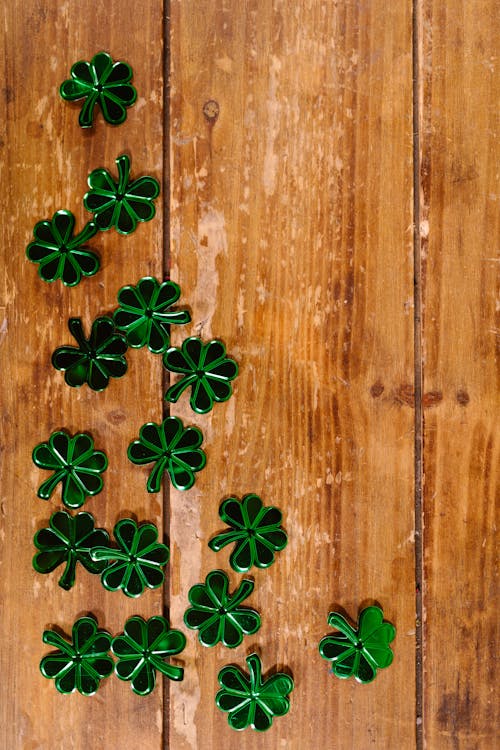 Free Shamrock Props on Wooden Surface  Stock Photo