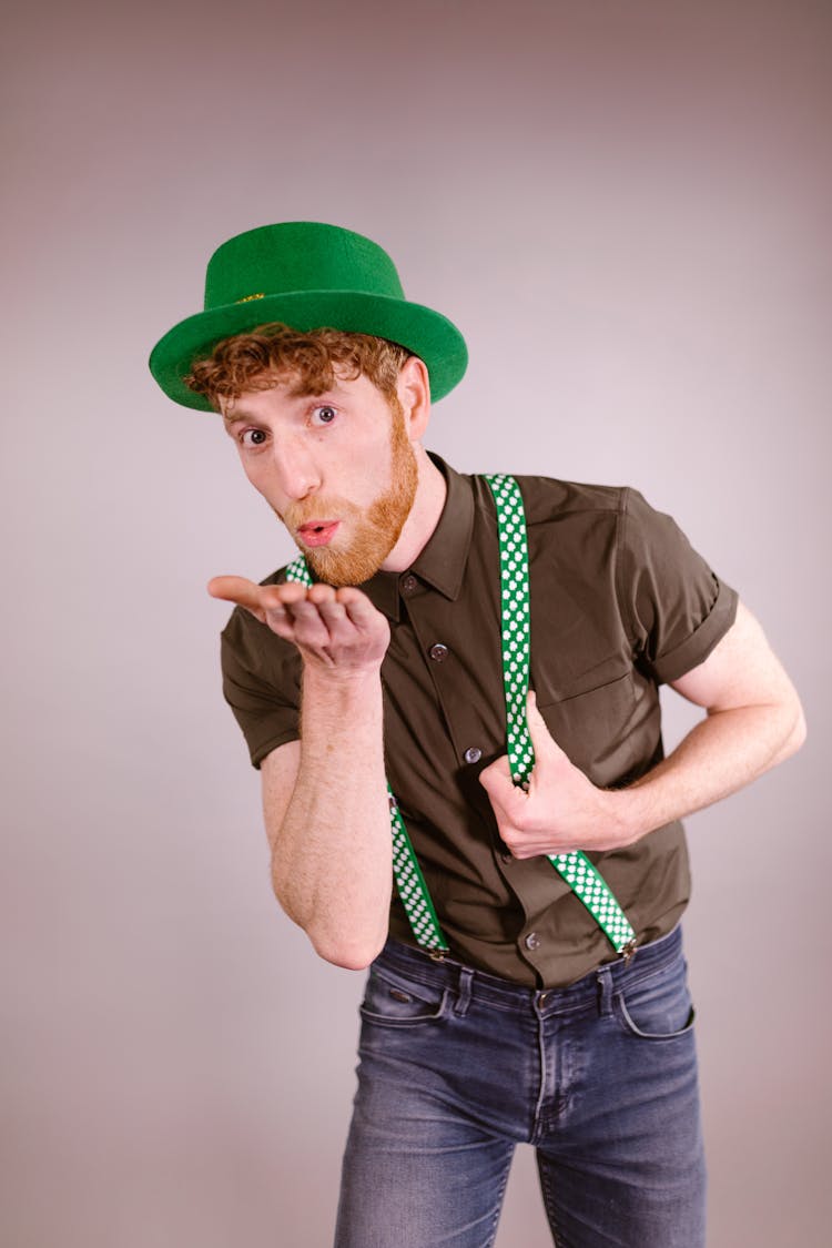 Goofy Man Wearing Green Hat 