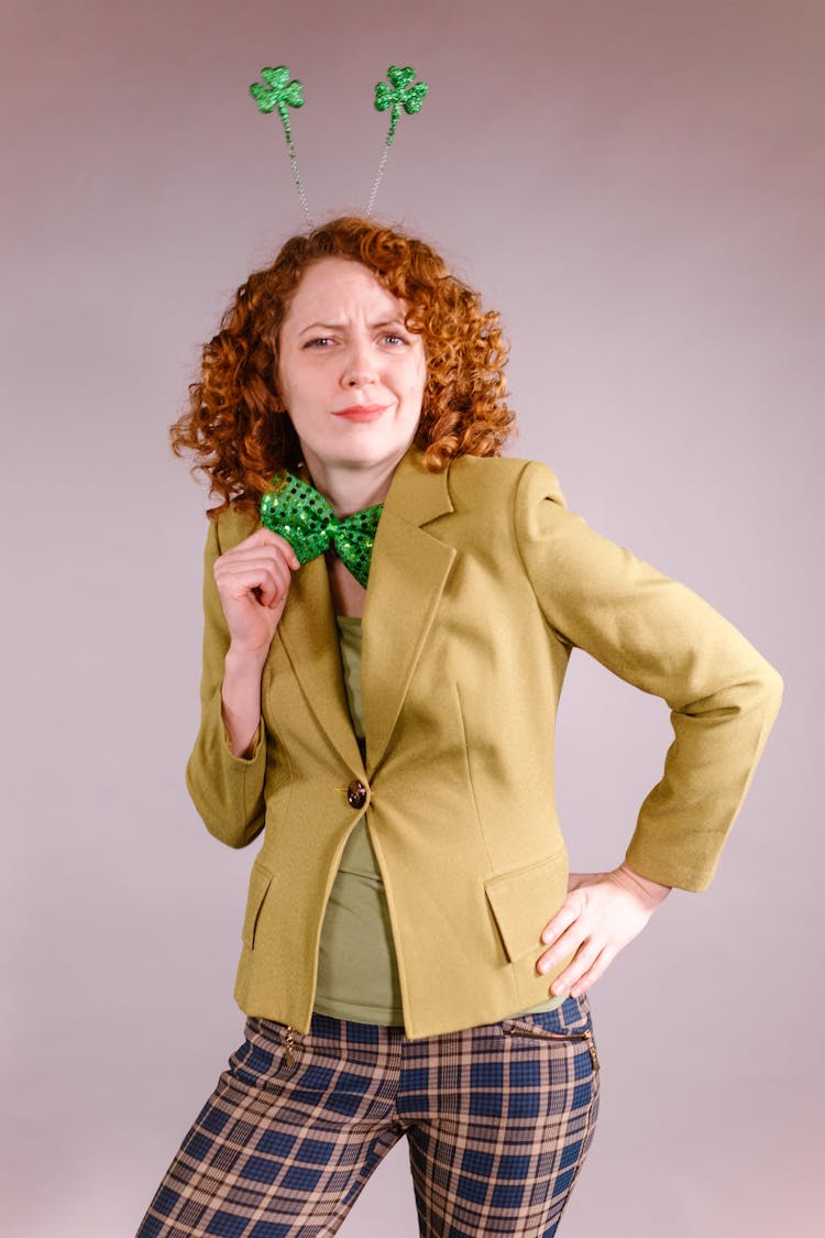 Woman In A Blazer Posing With Her Hand On Her Waist