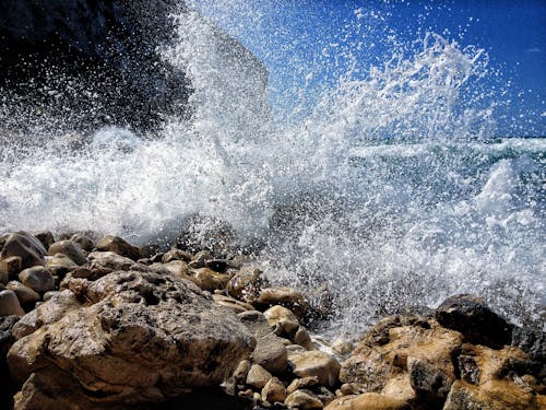 Sea Splash on Brown Stone