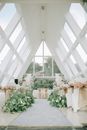 Decorated Aisle For Wedding Ceremony with High Ceiling