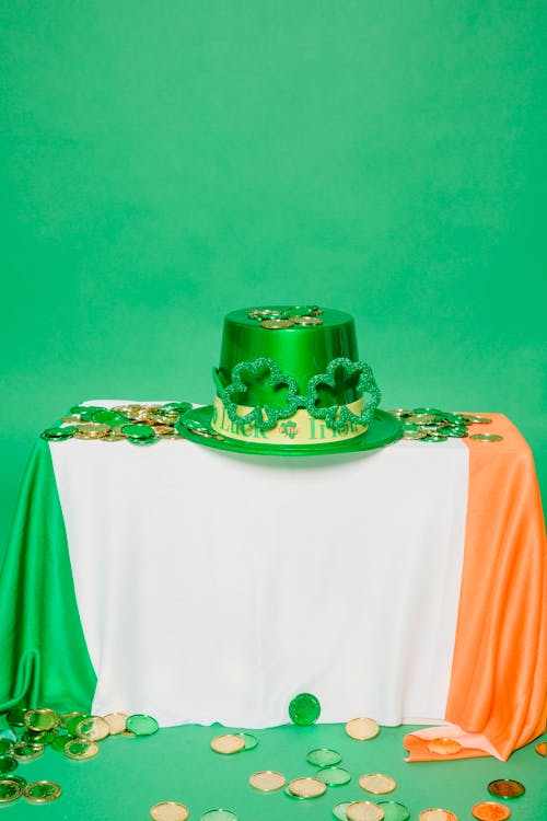 Festive hat with coins on flag
