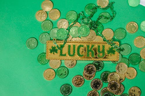 Free Golden lucky charm on coins Stock Photo