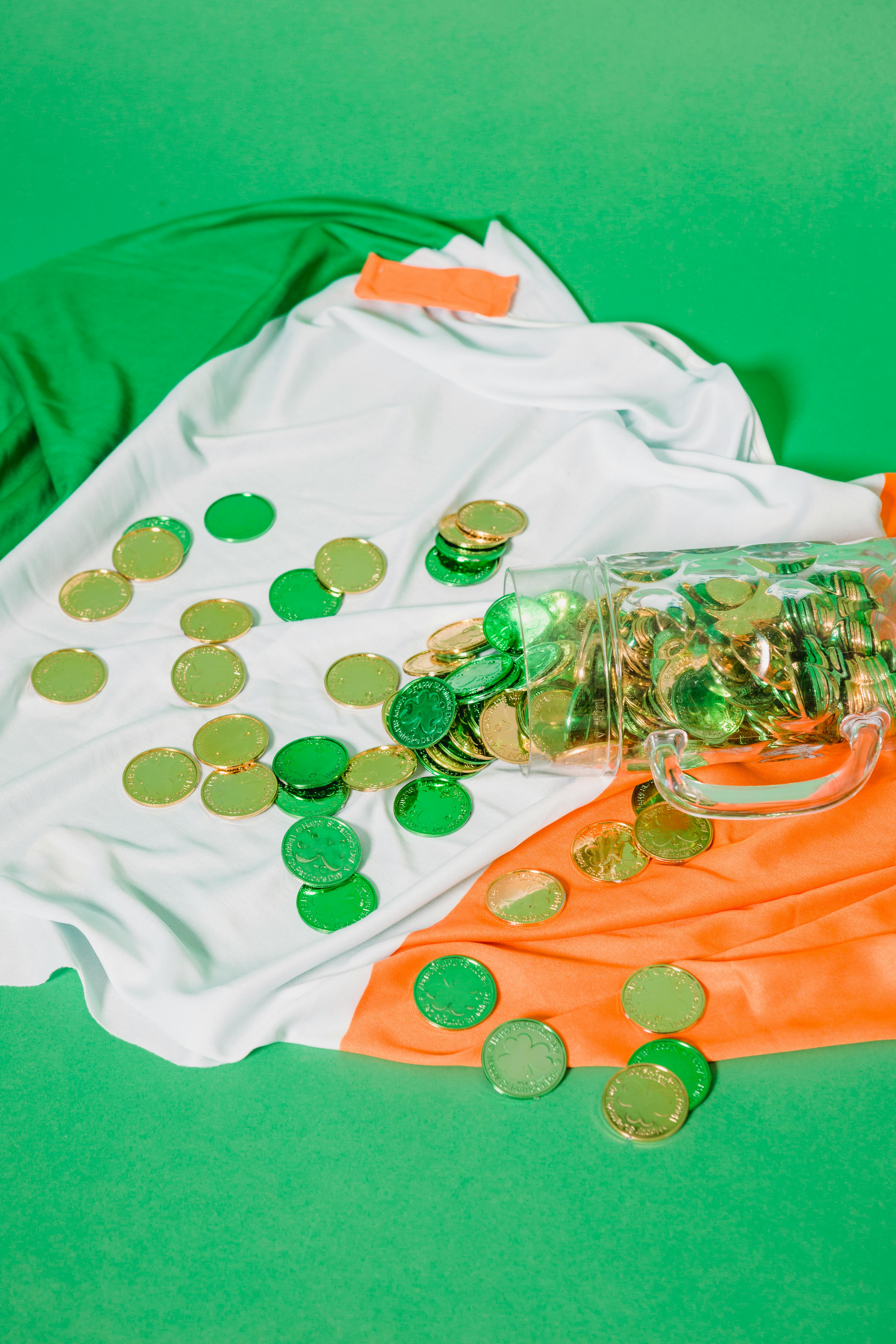 glass jar with coins on flag