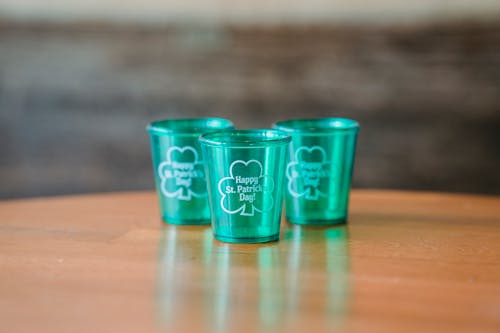 Glasses with congratulation of St Patricks day in pub