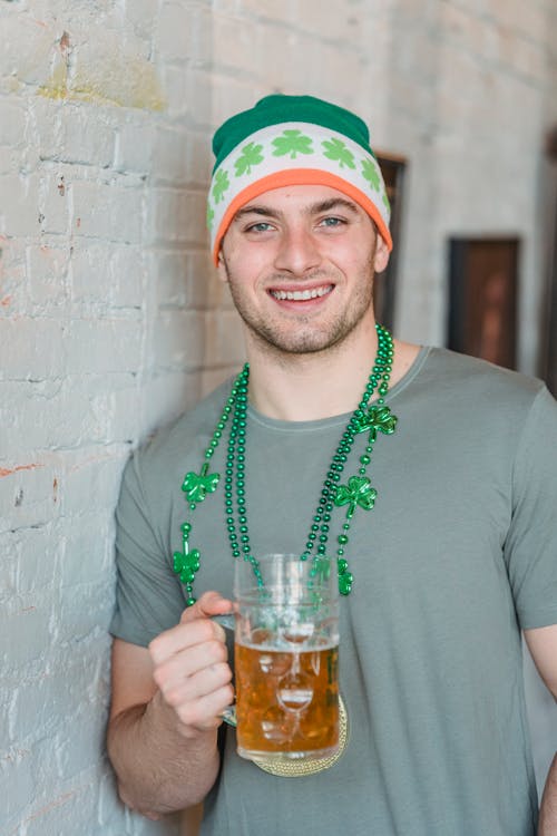 Free A Man Holding a Beer Mug Stock Photo