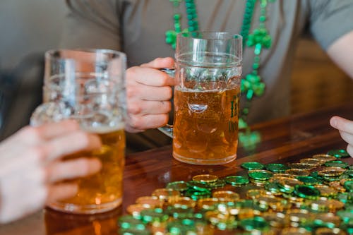 Close-up Photo of Beer on Jugs 