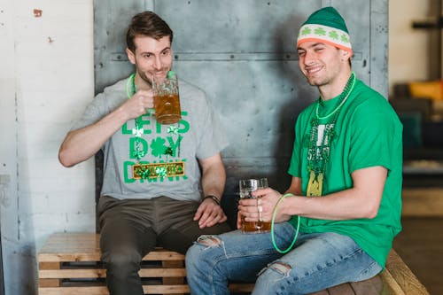 Two Men Having Fun Drinking during Saint Patrick's Day