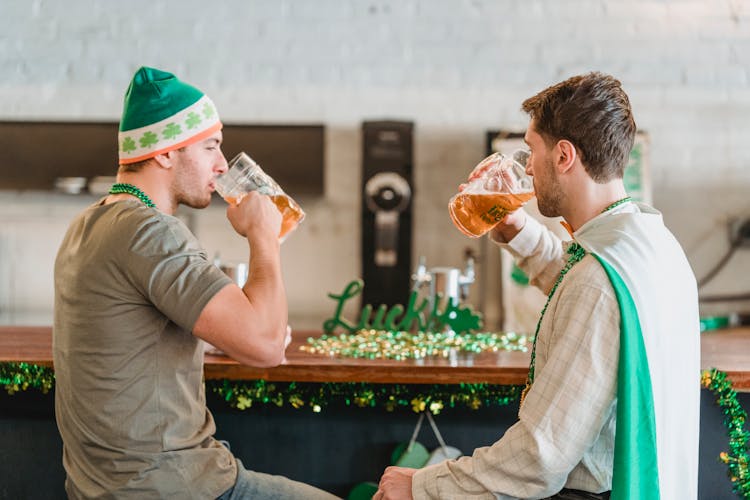 Two Men Drinking Beers During Saint Patrick's Day