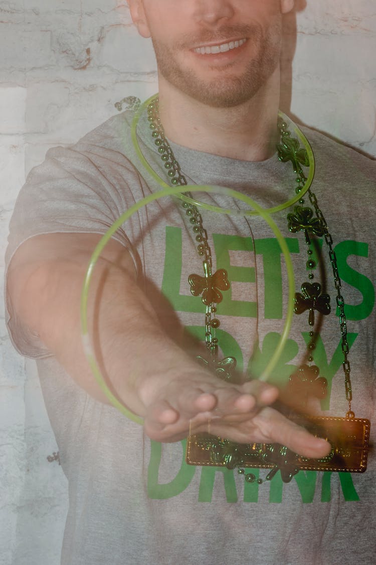 Close-up Of A Smiling Man Wearing Ornaments For St. Patricks Day Celebration 